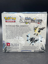 Sun & Moon Ultra Prism Booster Box includes acrylic case
